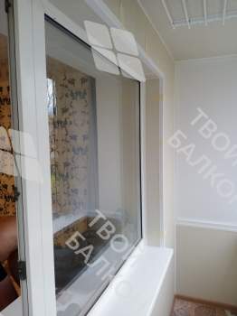 Отделка балкона под ключ с холодным остеклением и выносом остекления