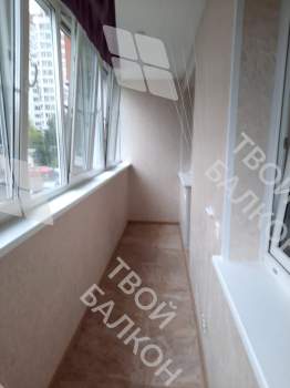 Остекление и отделка балкона Лодочка