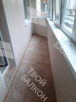 Остекление и отделка балкона Лодочка