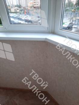 Остекление и отделка балкона Лодочка