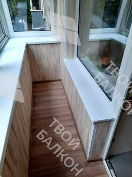 Холодное остекление и отделка П-образного балкона