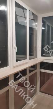 Панорамное остекление с тонировкой и отделка балкона