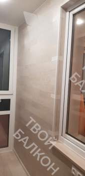 Панорамное остекление с тонировкой и отделка балкона