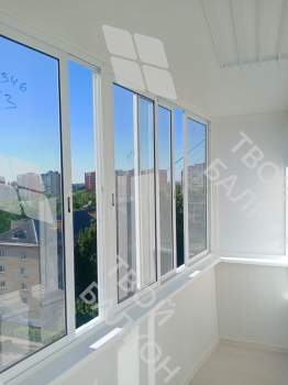 Остекление балкона и отделка стен