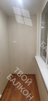 Остекление балкона и балконного блока профилем Rehau 60 и отделка панелями ПВХ