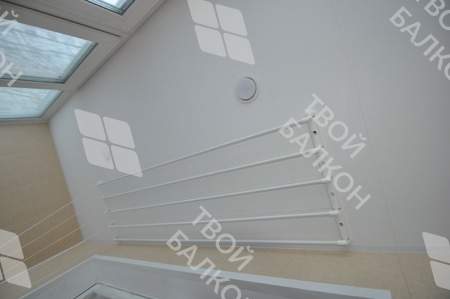 Остекление и отделка балкона ПВХ панелями и ламинатом